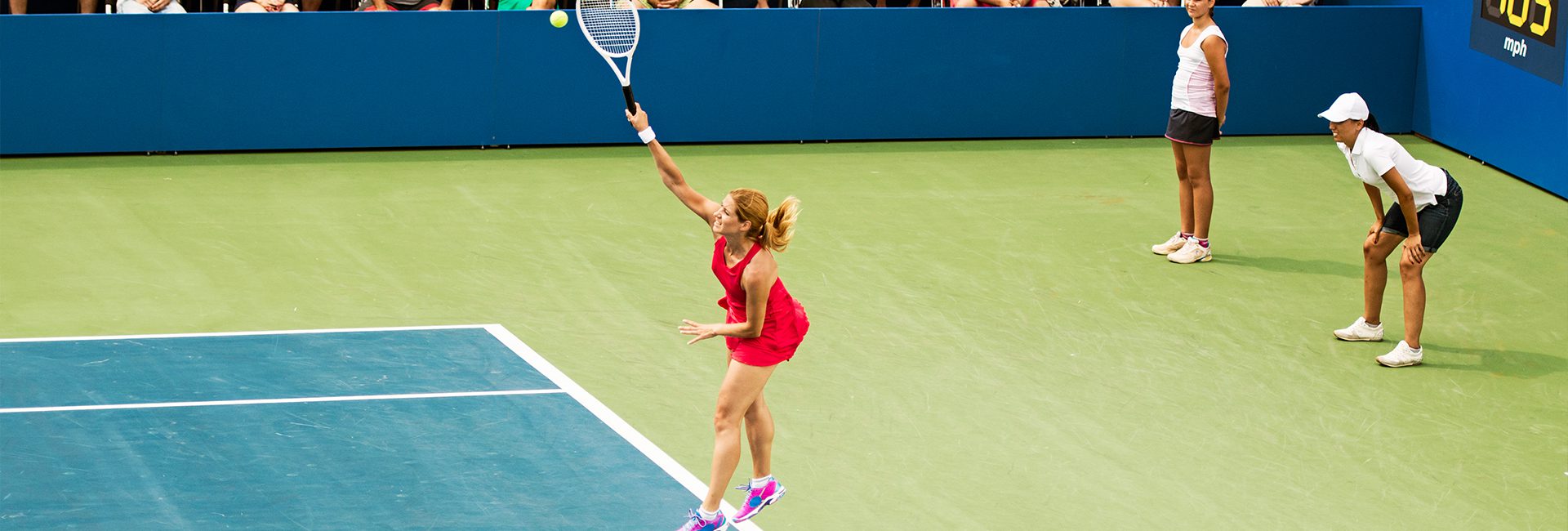 woman playing a tennis match