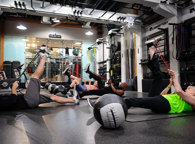 people working out together in a gym
